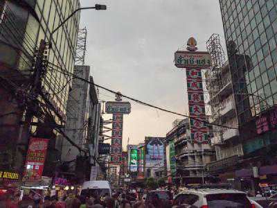 Choatic streets and signage in Bangkok's Chinatown